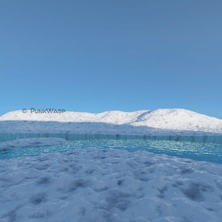 A wintry landscape with a river flowing across it.